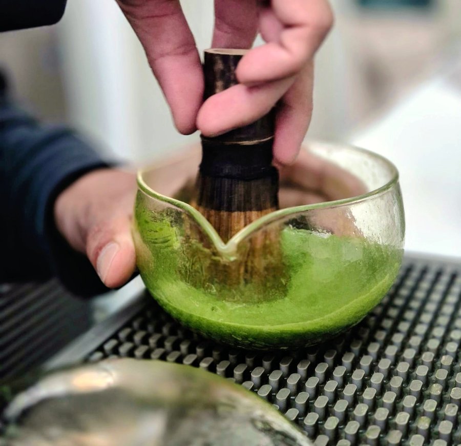 Whisking matcha
