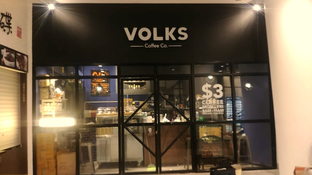 Volks Coffee Co. — the new sign goes up